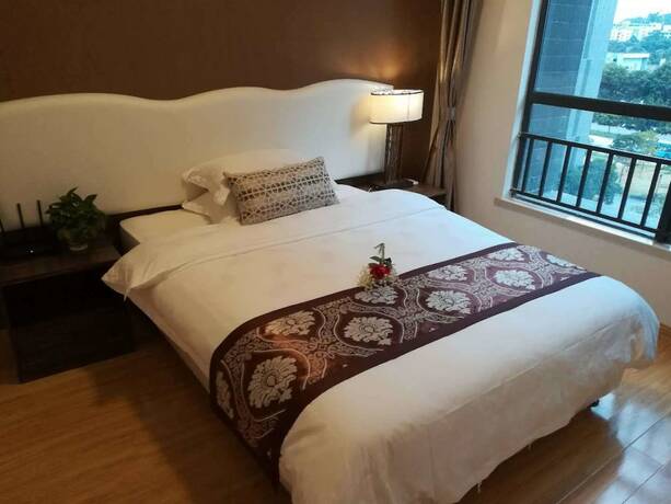 Imagen de la habitación del Hotel Guangzhou Chanson Apartment. Foto 19