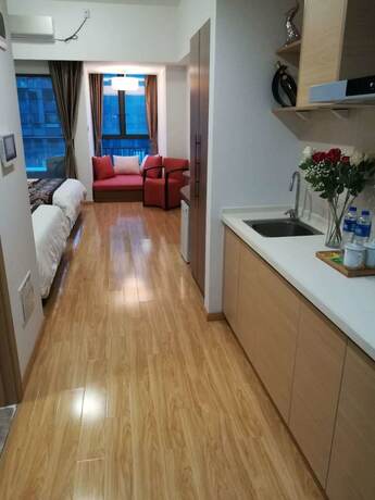 Imagen de la habitación del Hotel Guangzhou Chanson Apartment. Foto 20