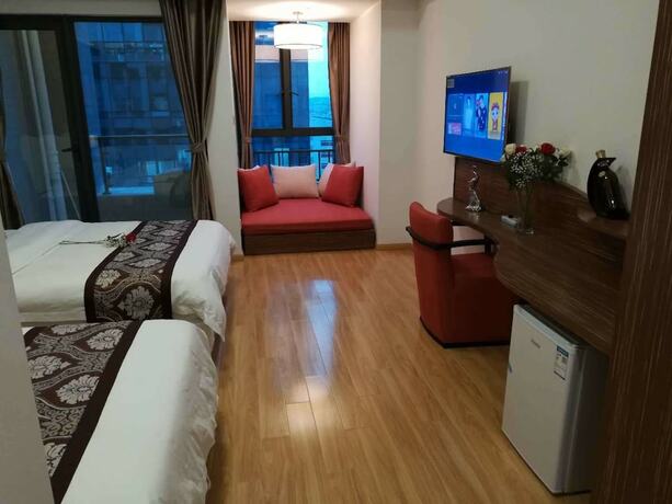 Imagen de la habitación del Hotel Guangzhou Chanson Apartment. Foto 21