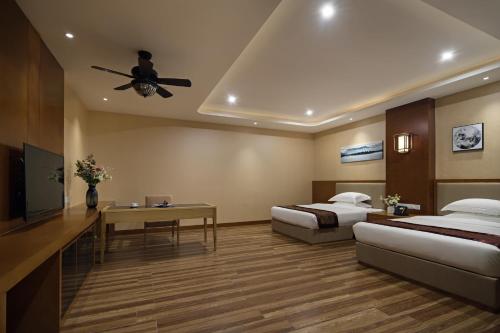 Imagen de la habitación del Hotel Guangzhou Cheermore Recreation Hotel. Foto 7