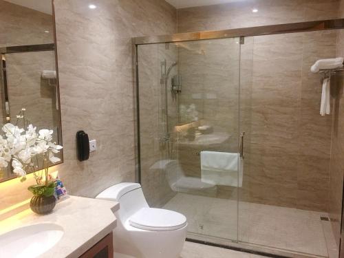 Imagen de la habitación del Hotel Guangzhou Cheermore Recreation Hotel. Foto 10