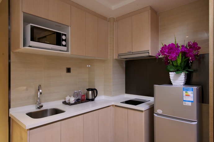 Imagen de la habitación del Hotel Guangzhou Chimelong Heefun International Service Apartment. Foto 11