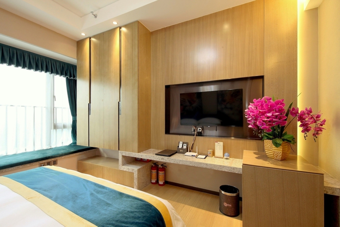 Imagen de la habitación del Hotel Guangzhou Chimelong Heefun International Service Apartment. Foto 15