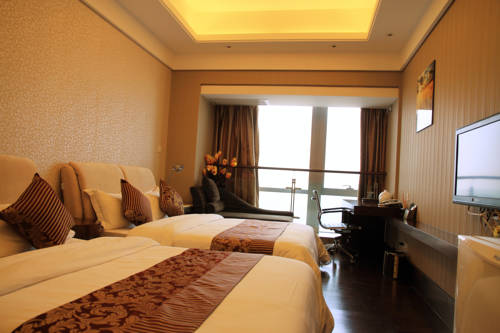 Imagen de la habitación del Hotel Guangzhou City Inn Apartment Changgang. Foto 1