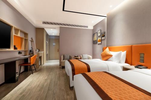 Imagen de la habitación del Hotel Guangzhou Cloud - Airport Terminal 2. Foto 19