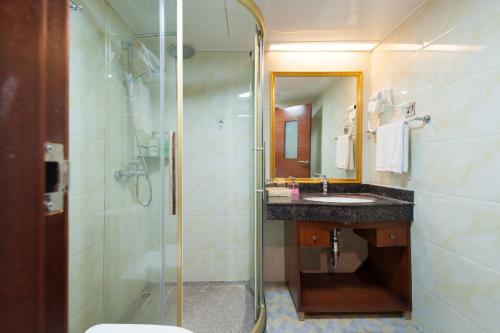 Imagen de la habitación del Hotel Guangzhou Compass. Foto 9