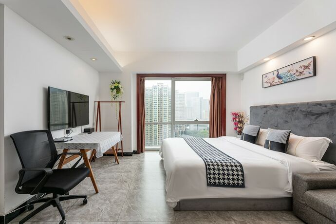 Imagen general del Hotel Guangzhou Damei Apartment. Foto 10