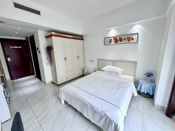 Imagen general del Hotel Guangzhou Damei Apartment. Foto 11