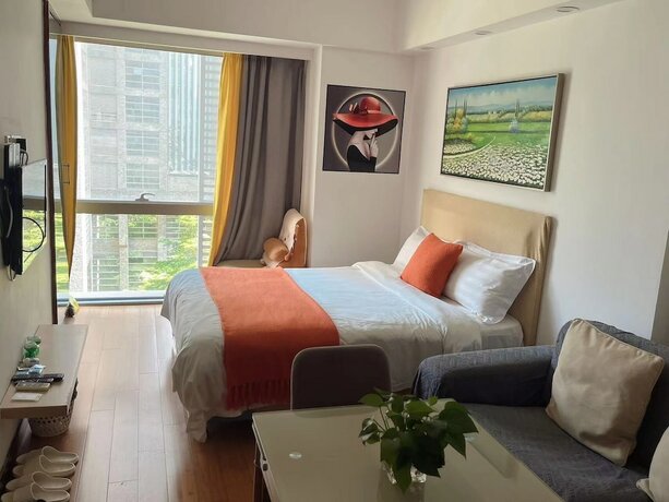 Imagen general del Hotel Guangzhou Damei Apartment. Foto 12