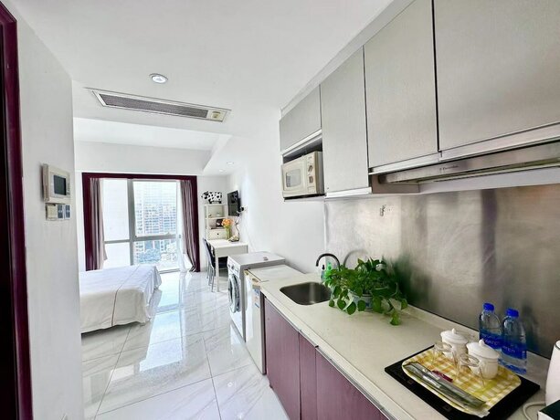 Imagen general del Hotel Guangzhou Damei Apartment. Foto 13