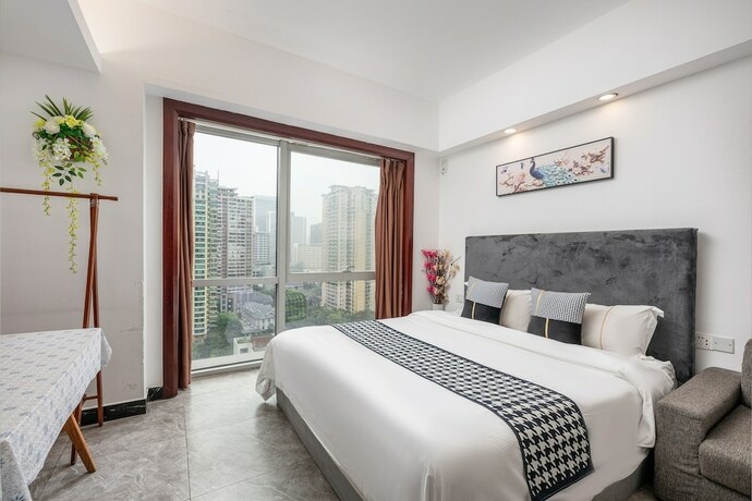Imagen general del Hotel Guangzhou Damei Apartment. Foto 14