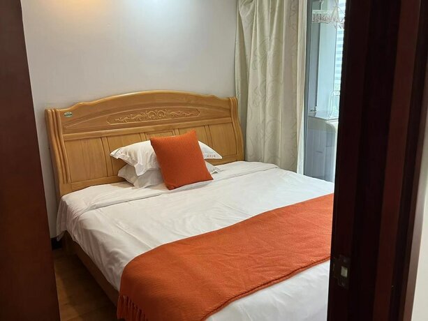 Imagen general del Hotel Guangzhou Damei Apartment. Foto 17