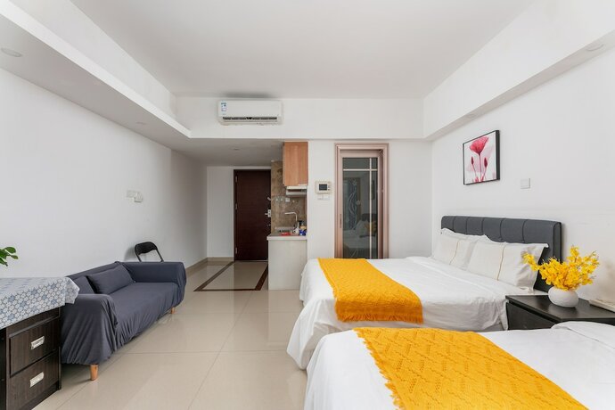 Imagen de la habitación del Hotel Guangzhou Damei Apartment. Foto 23