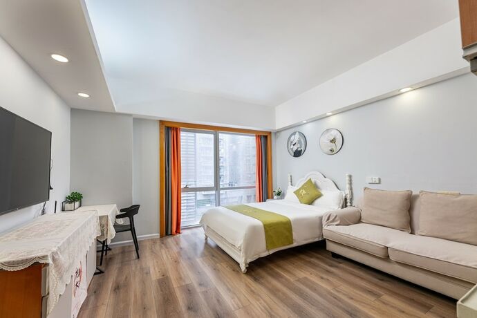 Imagen de la habitación del Hotel Guangzhou Damei Apartment. Foto 26