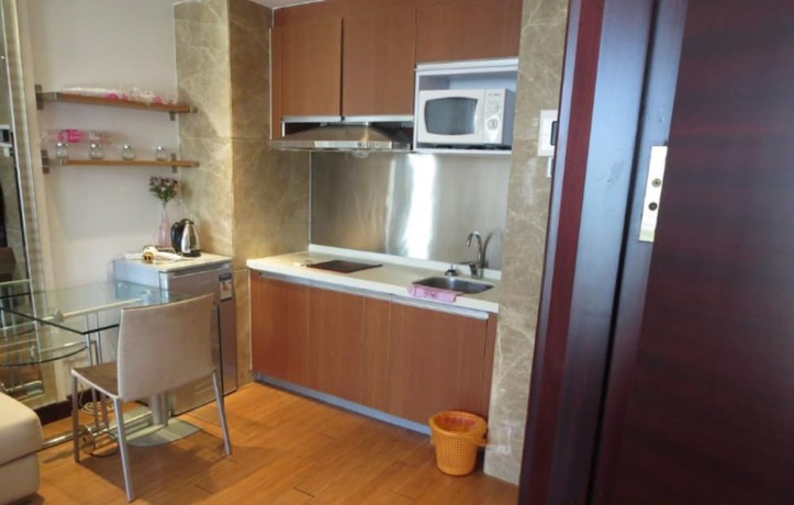 Imagen de la habitación del Hotel Guangzhou Damei Apartment. Foto 28