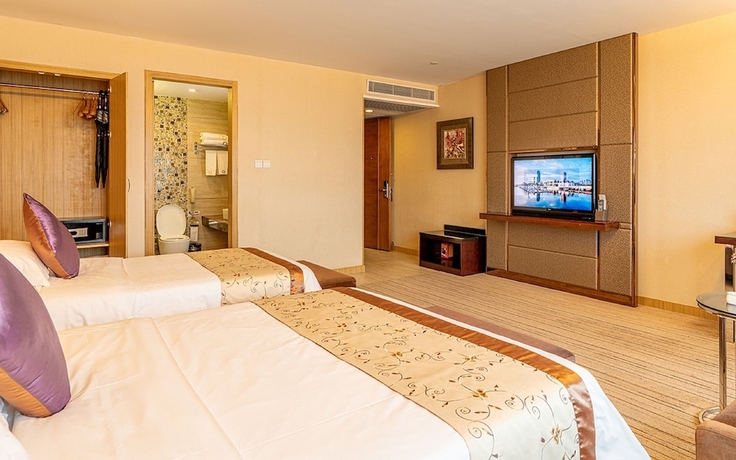 Imagen de la habitación del Hotel Guangzhou Easun Guotai. Foto 1