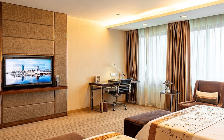 Imagen de la habitación del Hotel Guangzhou Easun Guotai. Foto 2