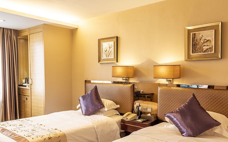 Imagen de la habitación del Hotel Guangzhou Easun Guotai. Foto 5