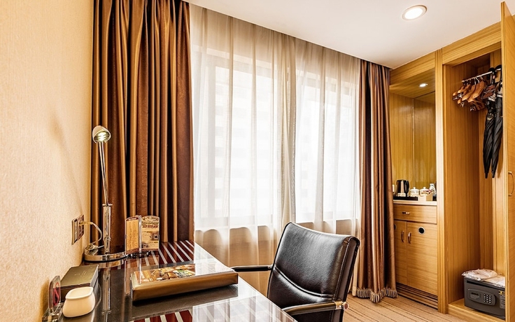 Imagen de la habitación del Hotel Guangzhou Easun Guotai. Foto 6