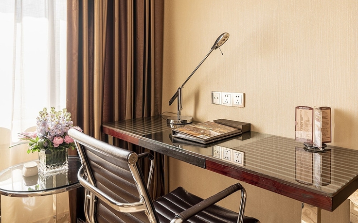 Imagen de la habitación del Hotel Guangzhou Easun Guotai. Foto 8