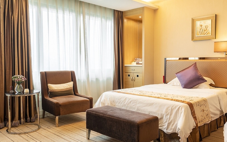 Imagen de la habitación del Hotel Guangzhou Easun Guotai. Foto 11