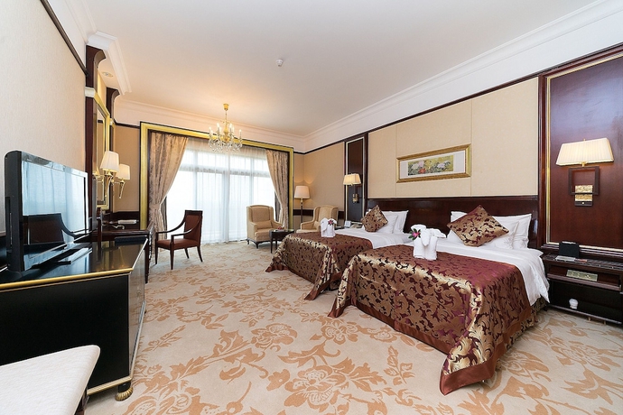 Imagen de la habitación del Hotel Guangzhou Evergrande. Foto 2
