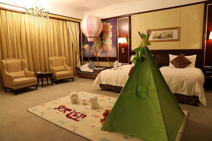 Imagen de la habitación del Hotel Guangzhou Evergrande. Foto 11