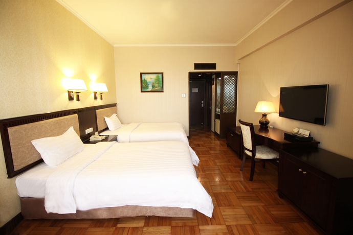 Imagen de la habitación del Hotel Guangzhou. Foto 4