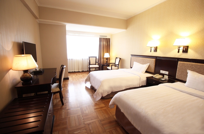 Imagen de la habitación del Hotel Guangzhou. Foto 5