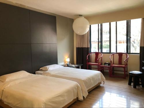 Imagen de la habitación del Hotel Guangzhou Fangyuan. Foto 7