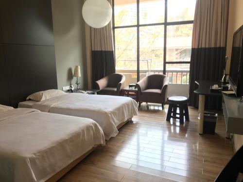 Imagen de la habitación del Hotel Guangzhou Fangyuan. Foto 8