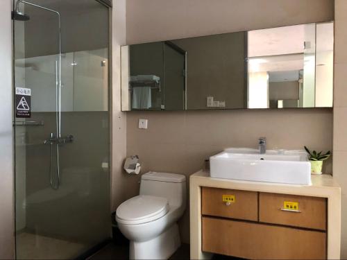 Imagen de la habitación del Hotel Guangzhou Fangyuan. Foto 9