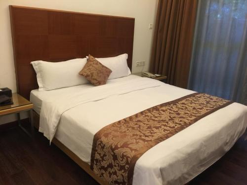 Imagen de la habitación del Hotel Guangzhou Fangyuan. Foto 10