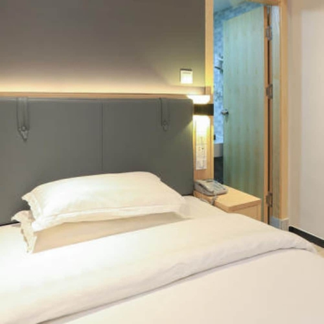Imagen de la habitación del Hotel Guangzhou Freedom. Foto 11