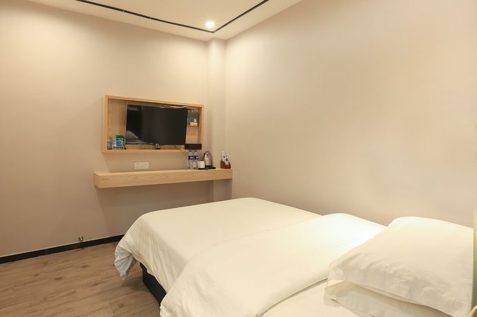 Imagen de la habitación del Hotel Guangzhou Freedom. Foto 15