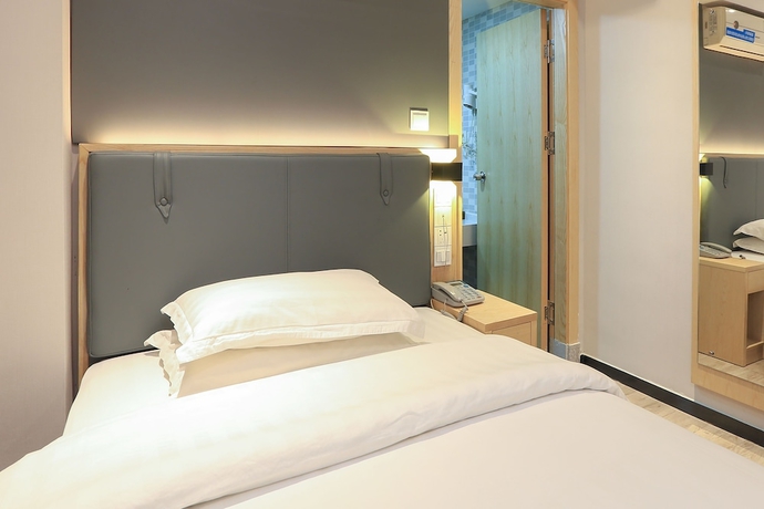 Imagen de la habitación del Hotel Guangzhou Freedom. Foto 16
