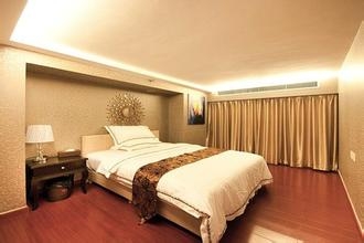 Imagen de la habitación del Hotel Guangzhou Grand View Golden Palace Apartment. Foto 2