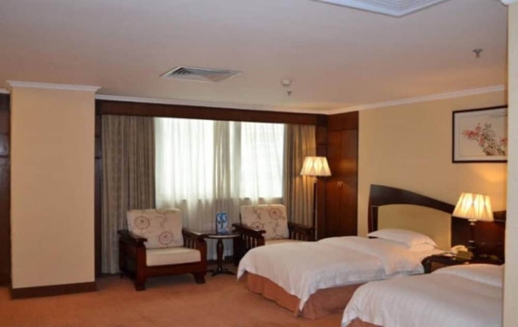 Imagen de la habitación del Hotel Guangzhou Guo Men. Foto 11