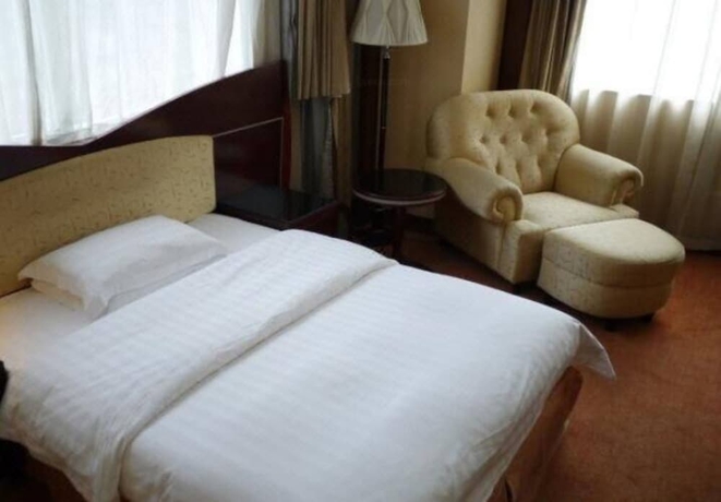 Imagen de la habitación del Hotel Guangzhou Guo Men. Foto 12