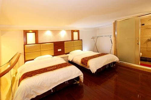 Imagen de la habitación del Hotel Guangzhou Hakka Apartment Beijing Road. Foto 10