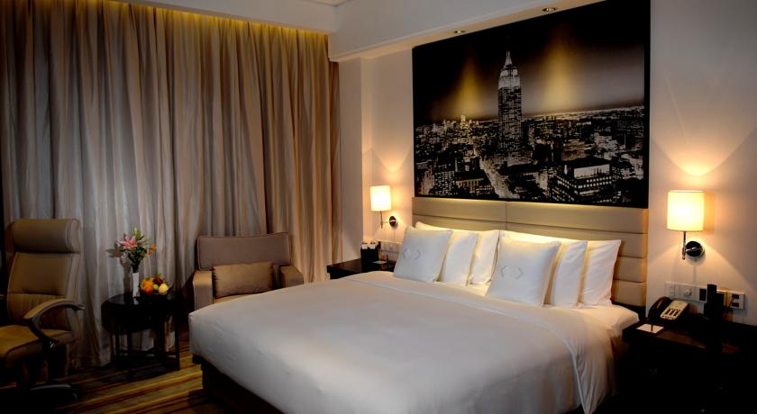 Imagen de la habitación del Hotel Guangzhou Haoyin Kailai. Foto 5
