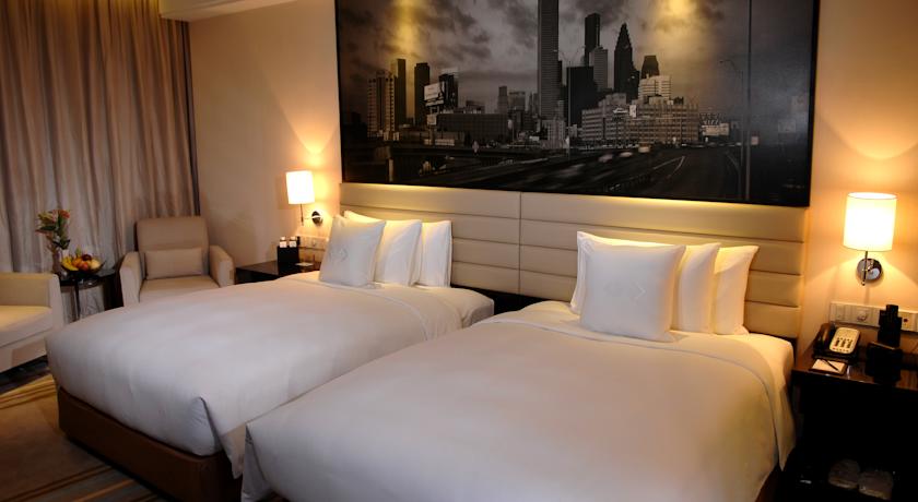 Imagen de la habitación del Hotel Guangzhou Haoyin Kailai. Foto 6