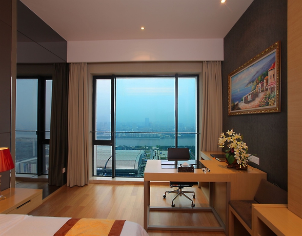 Imagen de la habitación del Hotel Guangzhou Heefun Apartment - Poly World Trading Center. Foto 2