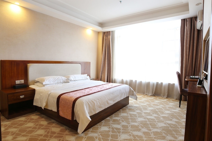 Imagen de la habitación del Hotel Guangzhou Helong. Foto 2