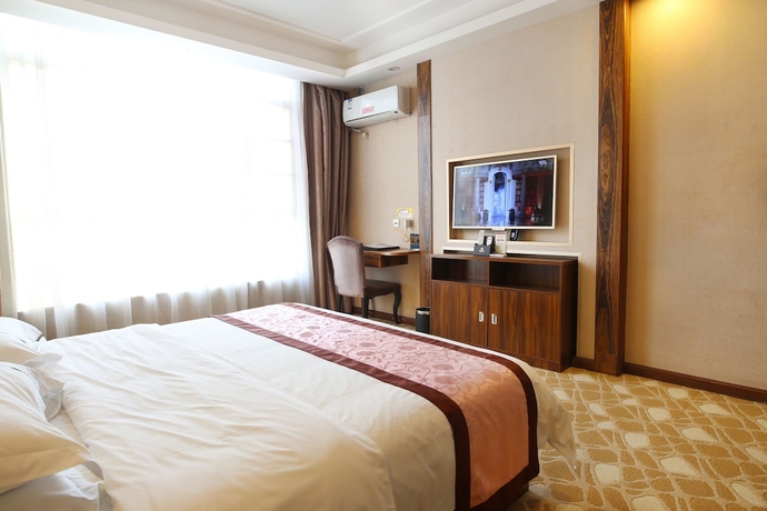 Imagen de la habitación del Hotel Guangzhou Helong. Foto 5