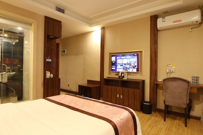 Imagen de la habitación del Hotel Guangzhou Helong. Foto 7