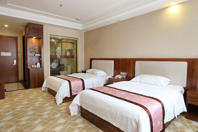 Imagen de la habitación del Hotel Guangzhou Helong. Foto 8