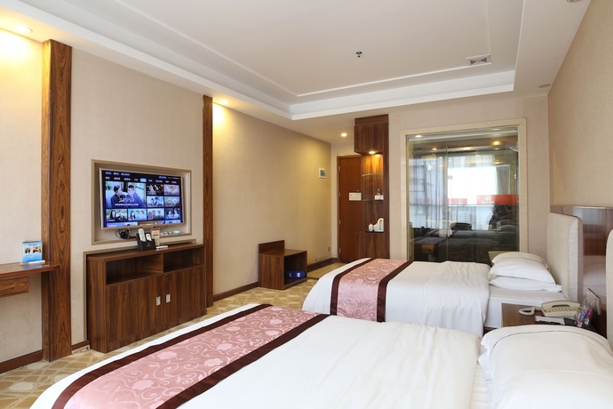 Imagen de la habitación del Hotel Guangzhou Helong. Foto 9