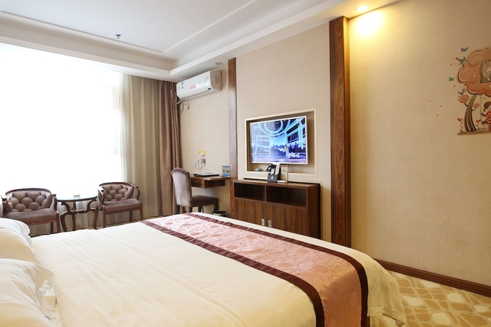 Imagen de la habitación del Hotel Guangzhou Helong. Foto 10