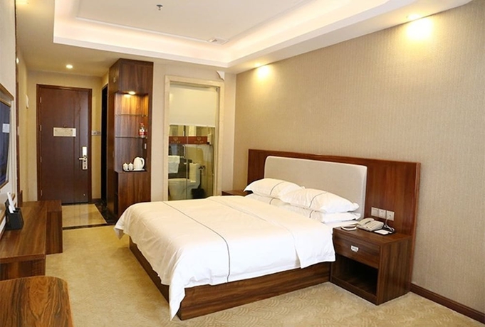 Imagen de la habitación del Hotel Guangzhou Helong. Foto 12